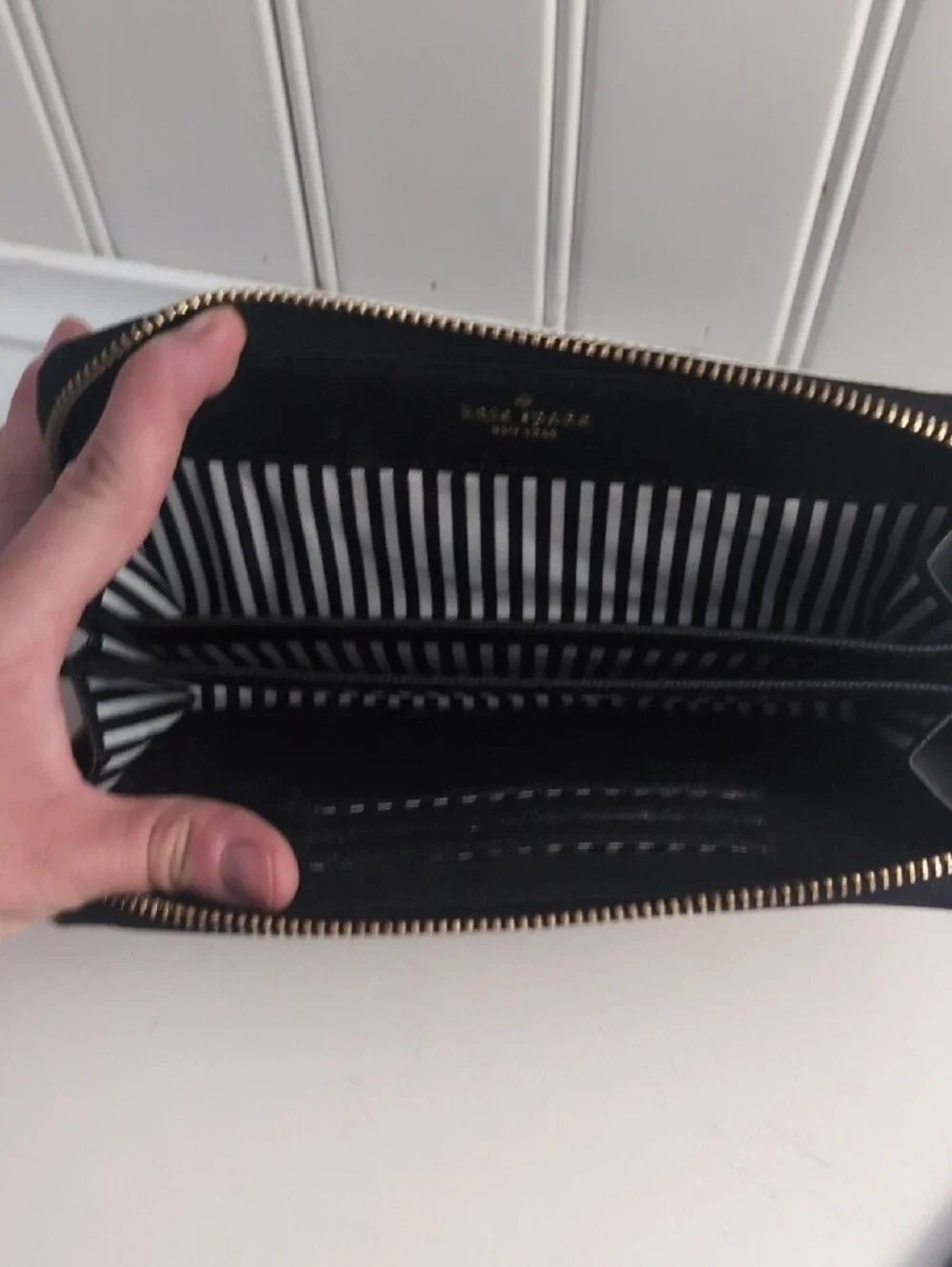 kate spade black zip-around wristlet wallet with gold logo